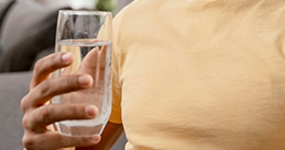 portrait-man-home-drinking-glass-water